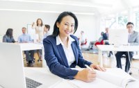 Young female professional in office setting