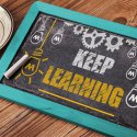 how to stay motivated to do school work Keep learning written on a chalkboard