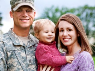 Military man with his wife & child